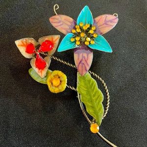 Beautiful brooch. Multiple colors and stones. Never worn. Great condition.